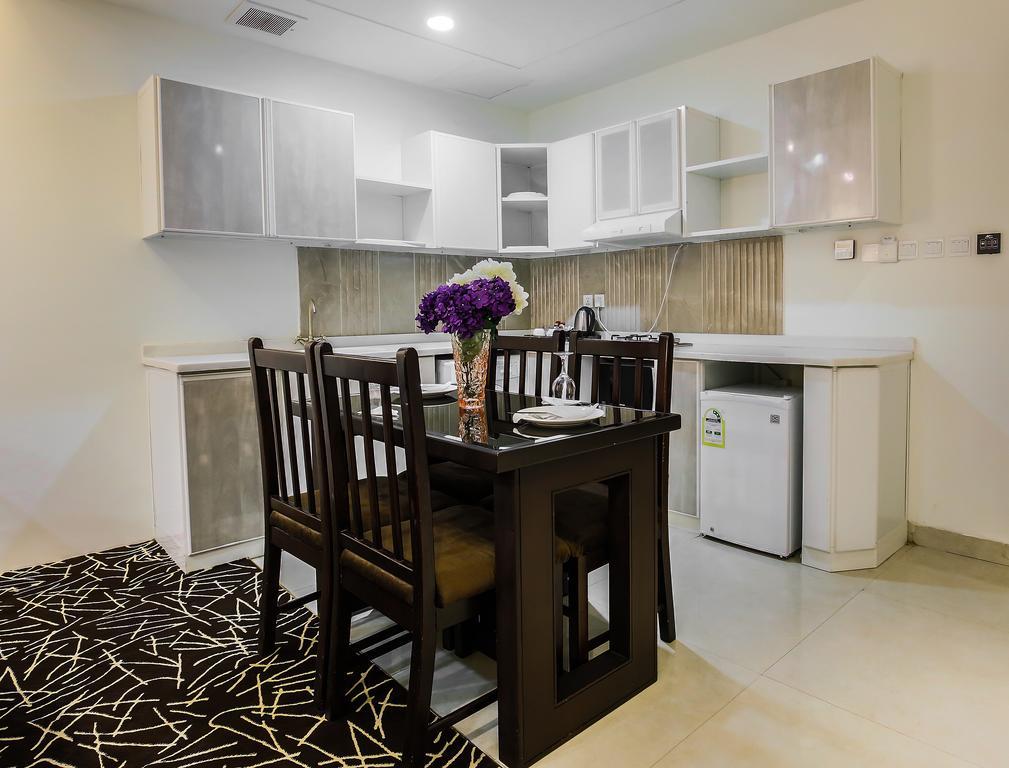 Rest Night Serviced Apartments- Alhamra Эр-Рияд Экстерьер фото A kitchen in a serviced apartment in Cairo, Egypt